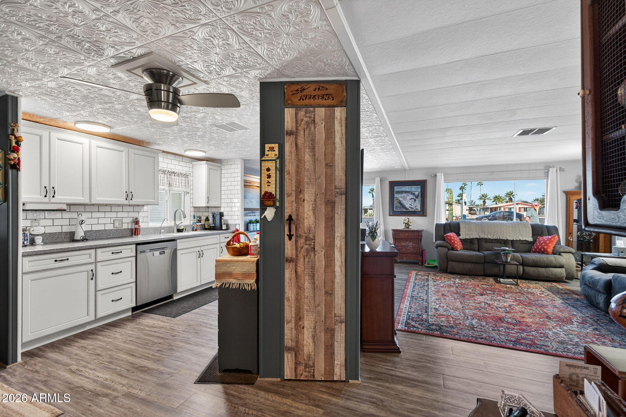 2100 North Trekell Road, Unit 196 Casa Grande, AZ 85122 - Photo 17 of 40 a kitchen that has a lot of cabinets a sink and appliances in it