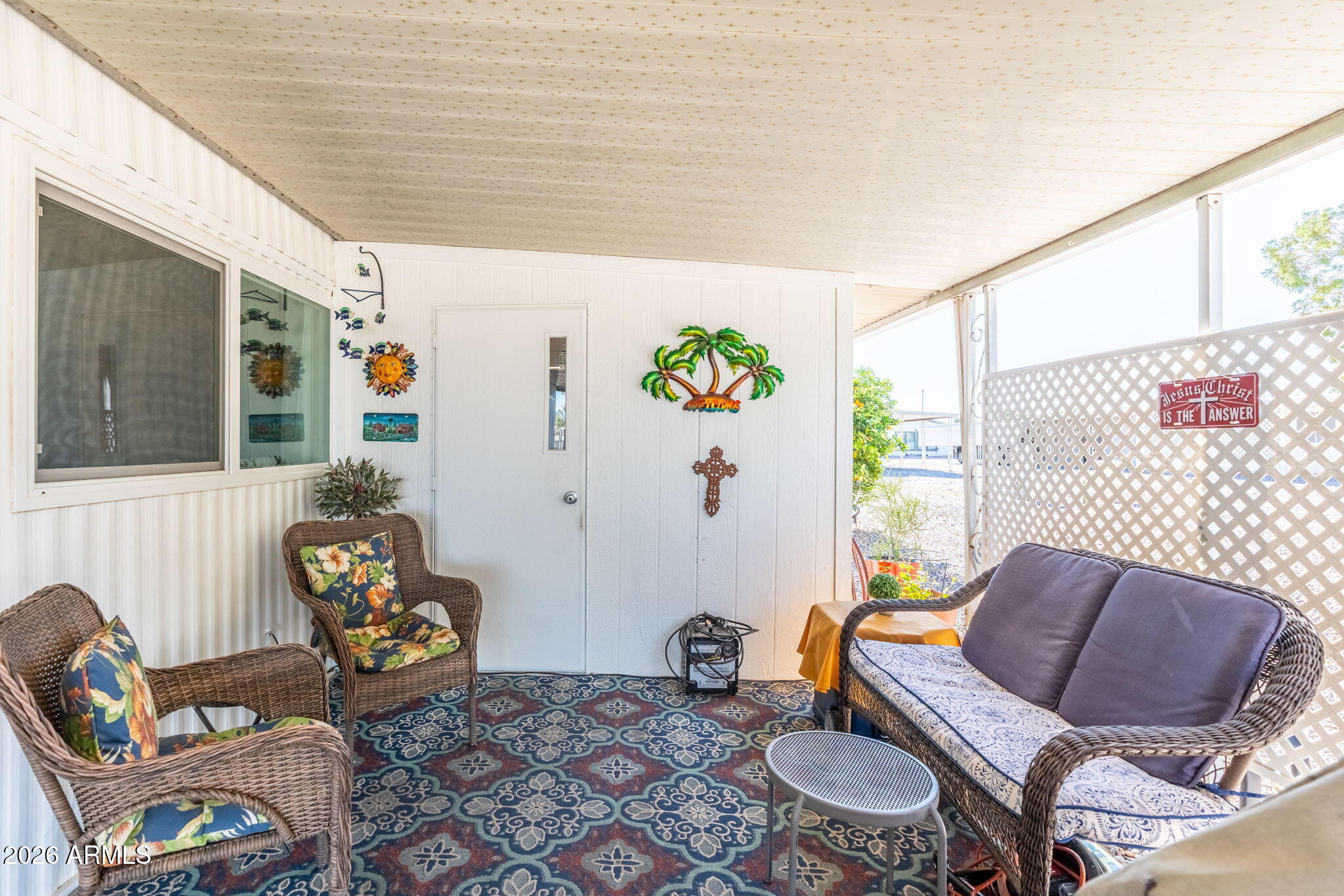 2100 North Trekell Road, Unit 196 Casa Grande, AZ 85122 - Photo 26 of 40 a living room with furniture and wooden floor