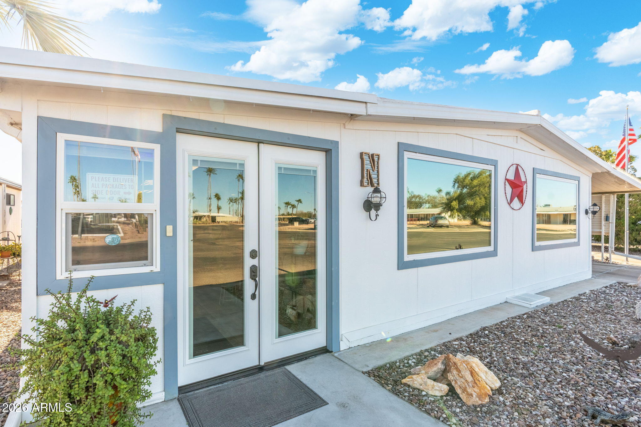 2100 North Trekell Road, Unit 196 Casa Grande, AZ 85122 - Photo 3 of 40 a view of an entryway with wooden floor