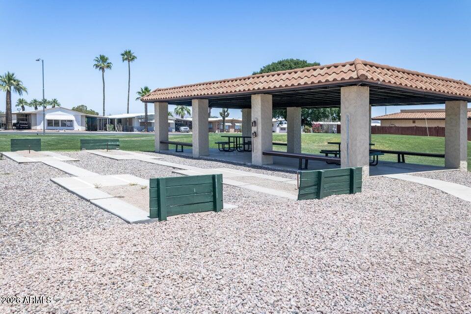 2100 North Trekell Road, Unit 196 Casa Grande, AZ 85122 - Photo 35 of 40 a front view of a house with garden
