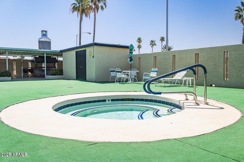 2100 North Trekell Road, Unit 196 Casa Grande, AZ 85122 - Photo 39 of 40 a view of a house with a swimming pool