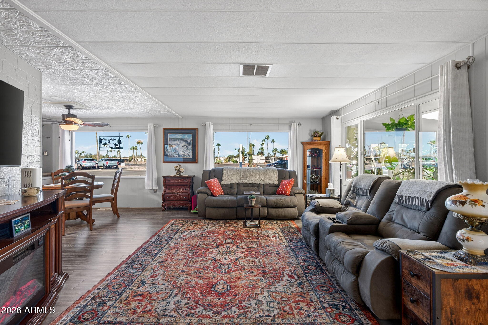 2100 North Trekell Road, Unit 196 Casa Grande, AZ 85122 - Photo 4 of 40 a living room with furniture and a large window