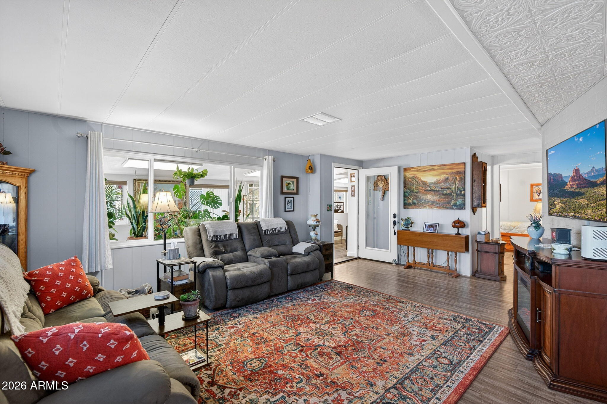 2100 North Trekell Road, Unit 196 Casa Grande, AZ 85122 - Photo 5 of 40 a living room with furniture and a rug