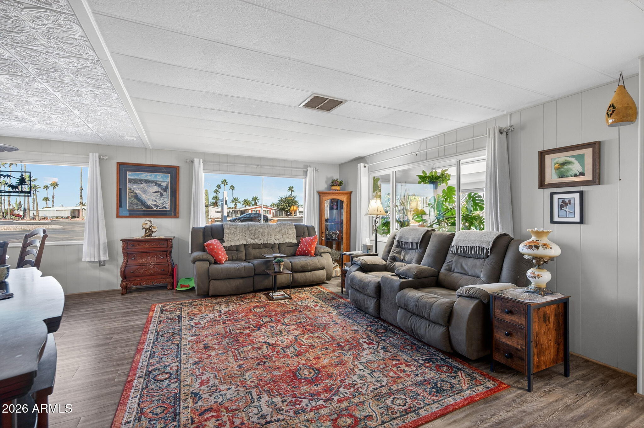 2100 North Trekell Road, Unit 196 Casa Grande, AZ 85122 - Photo 7 of 40 a living room with furniture or couch and a wooden floor