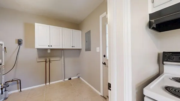 a view of a kitchen from the hallway