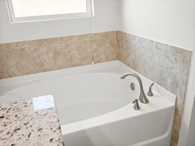 a bathroom with a bathtub