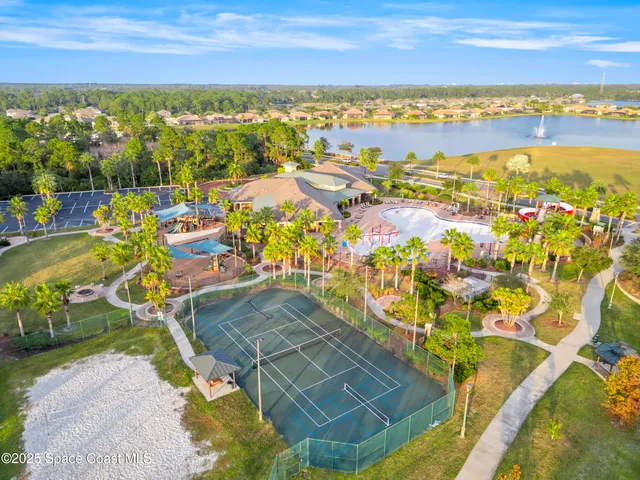a view of swimming pool from a lake view