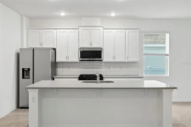 $411,990 | 27517 Stellar Sea Way, Howey-in-the-Hills, FL 34737