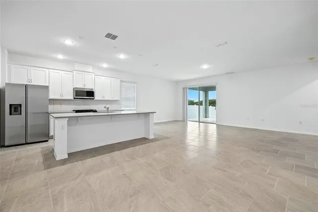 $411,990 | 27517 Stellar Sea Way, Howey-in-the-Hills, FL 34737