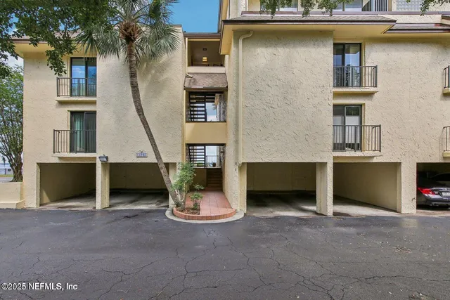 a view of house with outdoor space and seating area