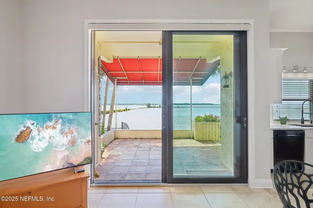 a bedroom with a bed and cabinets
