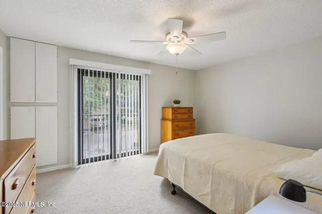 a view of empty room with fan