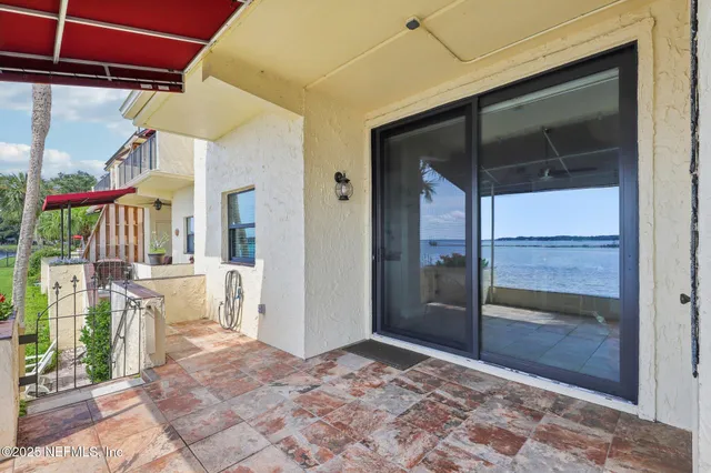 a view of a balcony with an ocean view