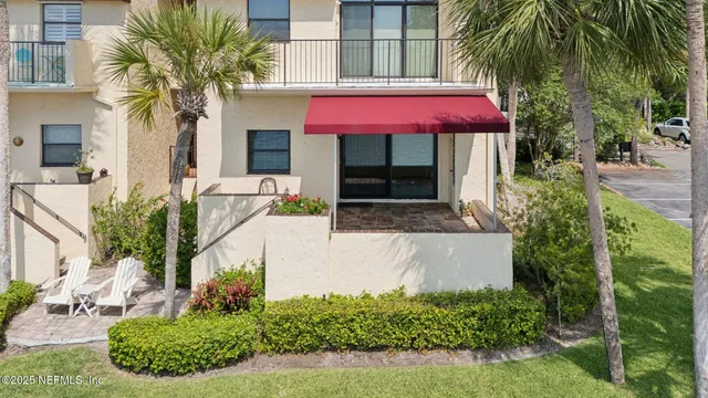 a view of building with yard