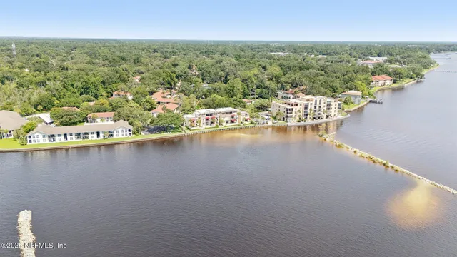 a view of a lake from a balcony