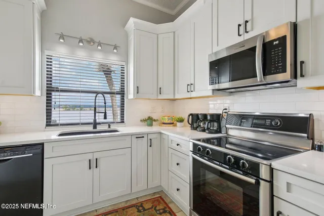 a kitchen with a sink and a window