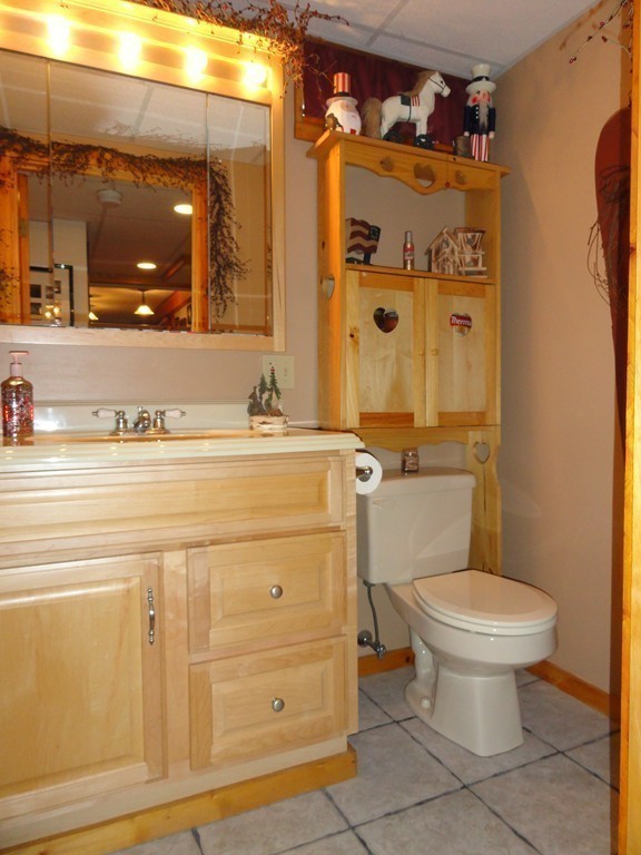 12 Laurelwood Road Rutland, MA 01543 - Photo 20 of 25 a bathroom with a sink a toilet and shower
