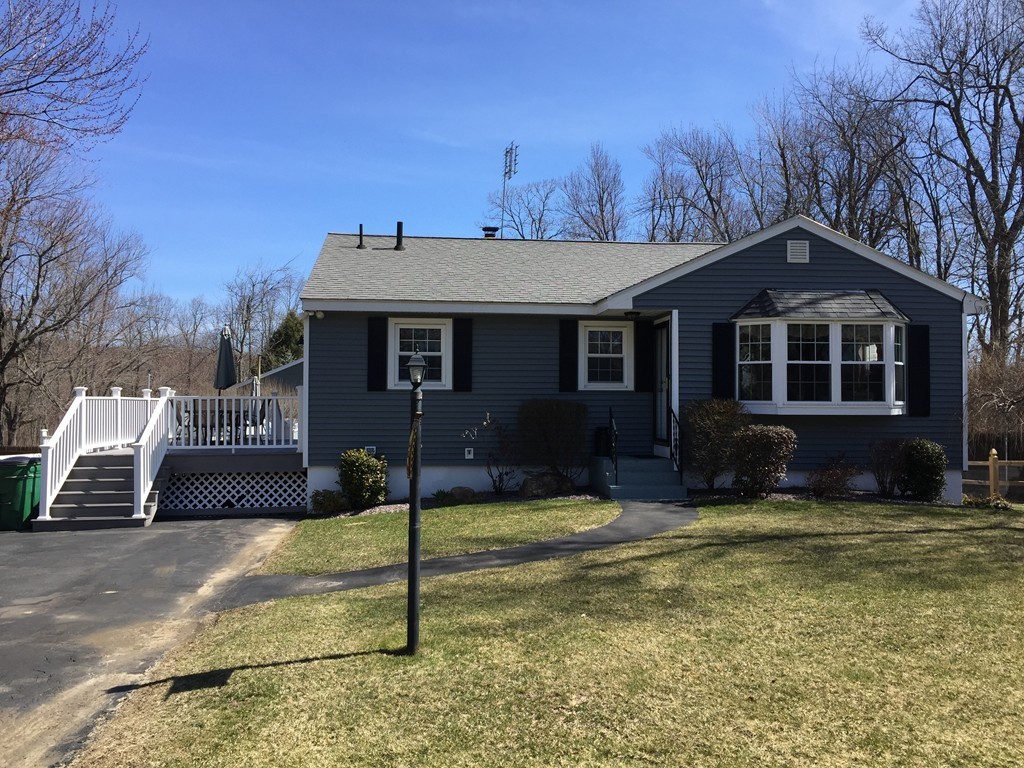 12 Laurelwood Road Rutland, MA 01543 - Photo 2 of 25 a front view of a house with a yard