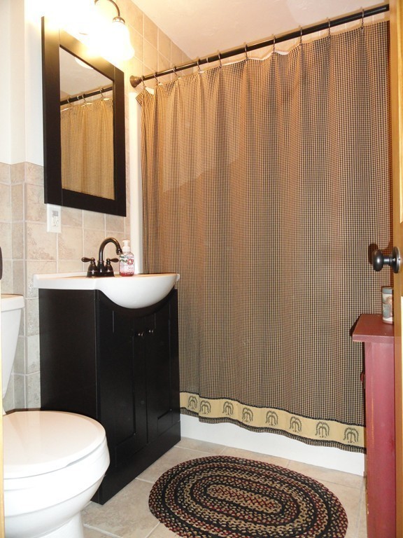 12 Laurelwood Road Rutland, MA 01543 - Photo 21 of 25 a bathroom with a sink and a toilet