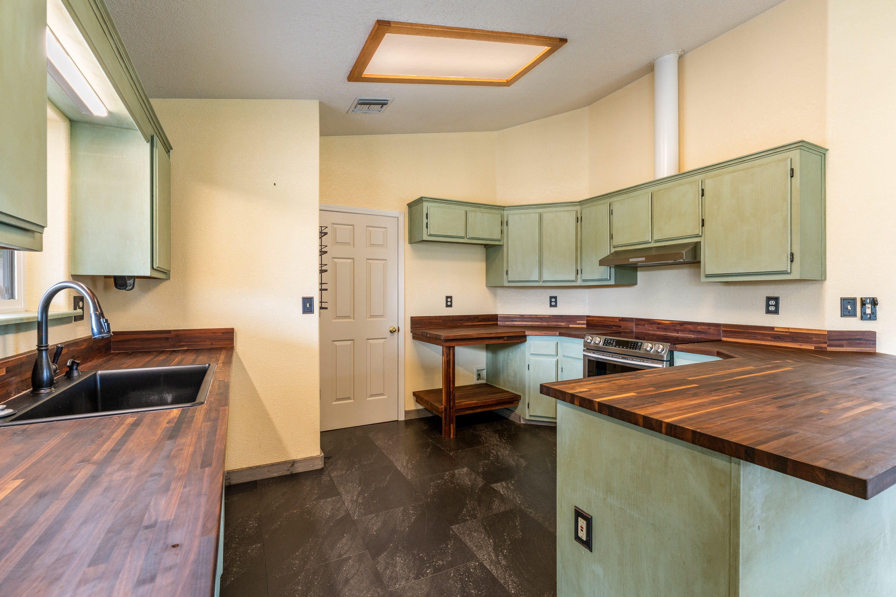 3655 Leonard Road Grants Pass, OR 97527 - Photo 25 of 52 Kitchen With Butcherblock Counter tops.