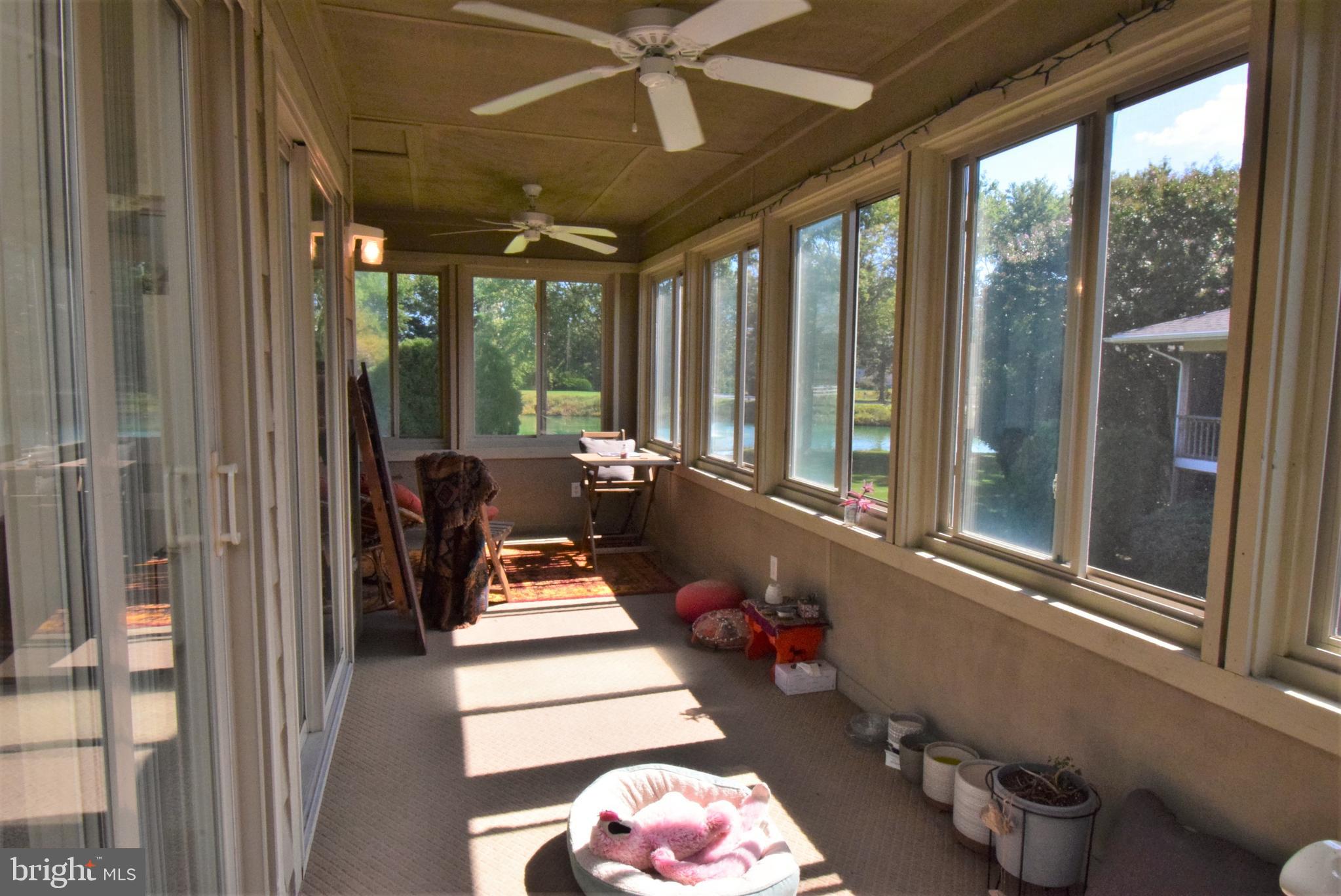18419 Berkeley Road, Unit 6 Lewes, DE 19958 - Photo 7 of 18 Perfect sunroom complete with ceiling fan