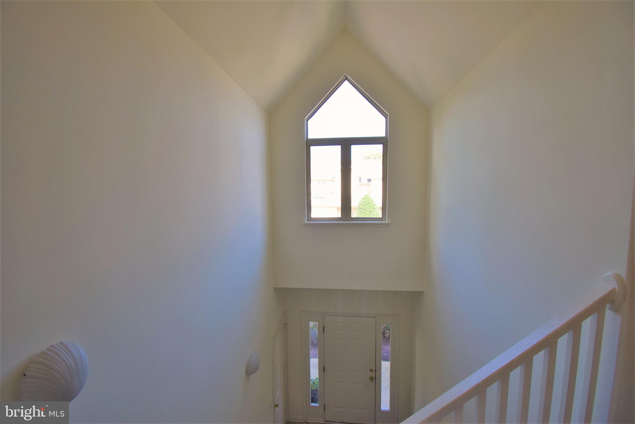 18419 Berkeley Road, Unit 6 Lewes, DE 19958 - Photo 9 of 18 SO much natural light with this beautiful atrium