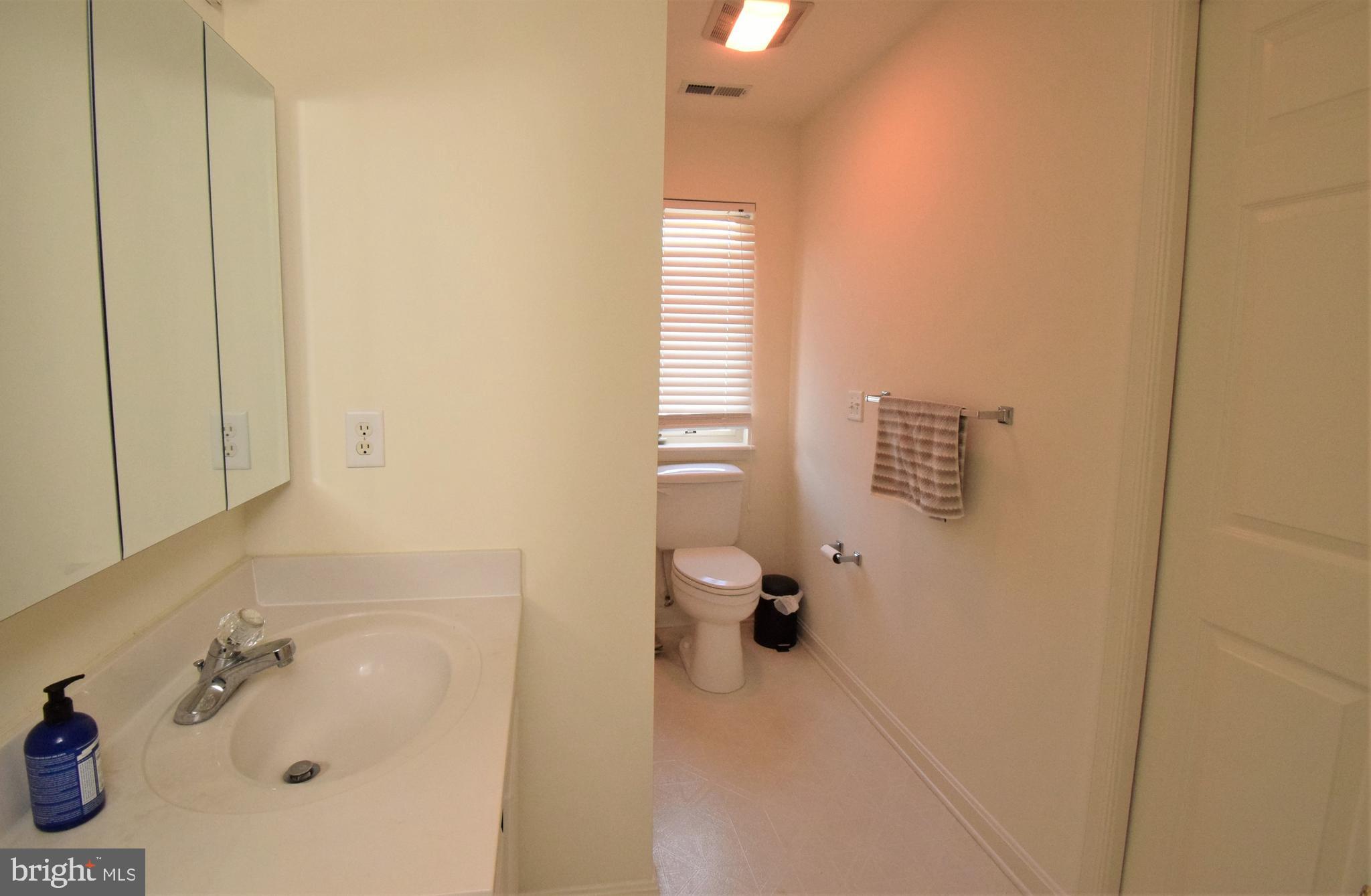 18419 Berkeley Road, Unit 6 Lewes, DE 19958 - Photo 10 of 18 Shared guest bath with 2nd BR private entry