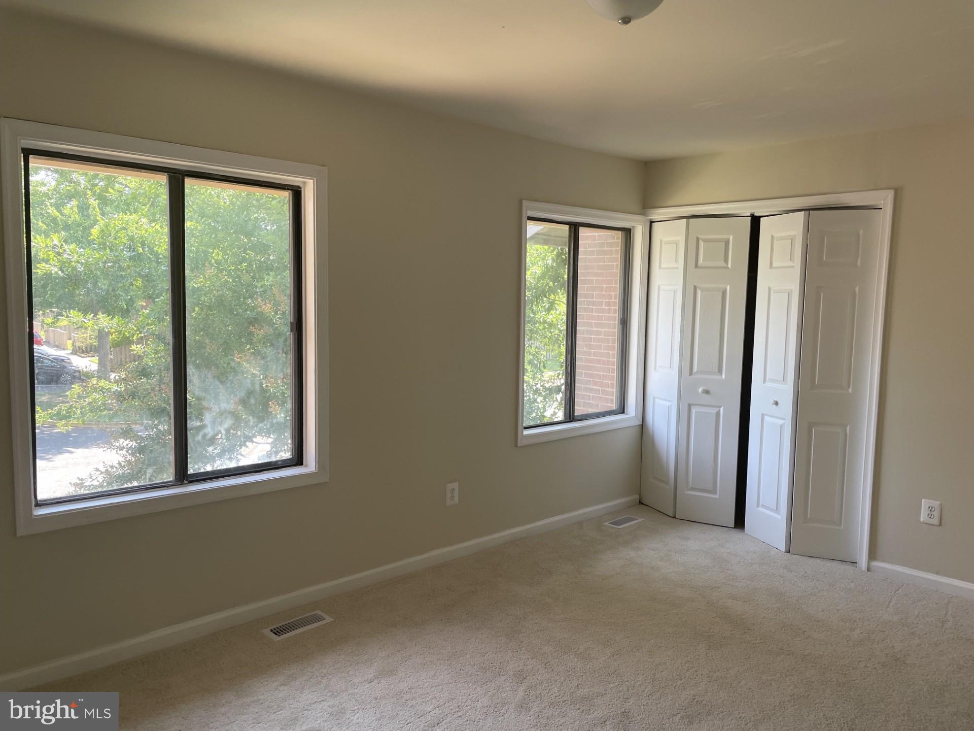 1287 Springtide Place Herndon, VA 20170 - Photo 16 of 23 a view of a room with a large window