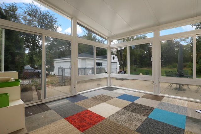 306 North Elmhurst Road Prospect Heights, IL 60070 - Photo 11 of 26 a view of a glass door with a glass door