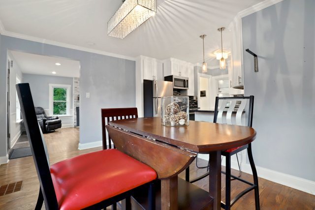 306 North Elmhurst Road Prospect Heights, IL 60070 - Photo 10 of 26 a view of a dining room with furniture