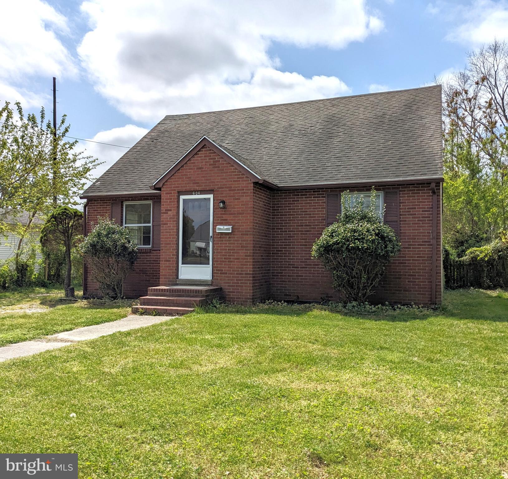 a house view with a garden space