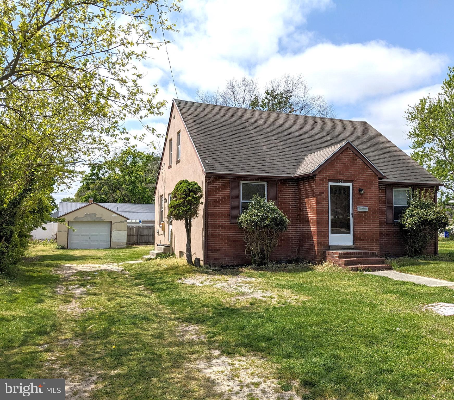 604 Hickory Lane Seaford, DE 19973 - Photo 2 of 2 a view of a house with a yard and plants