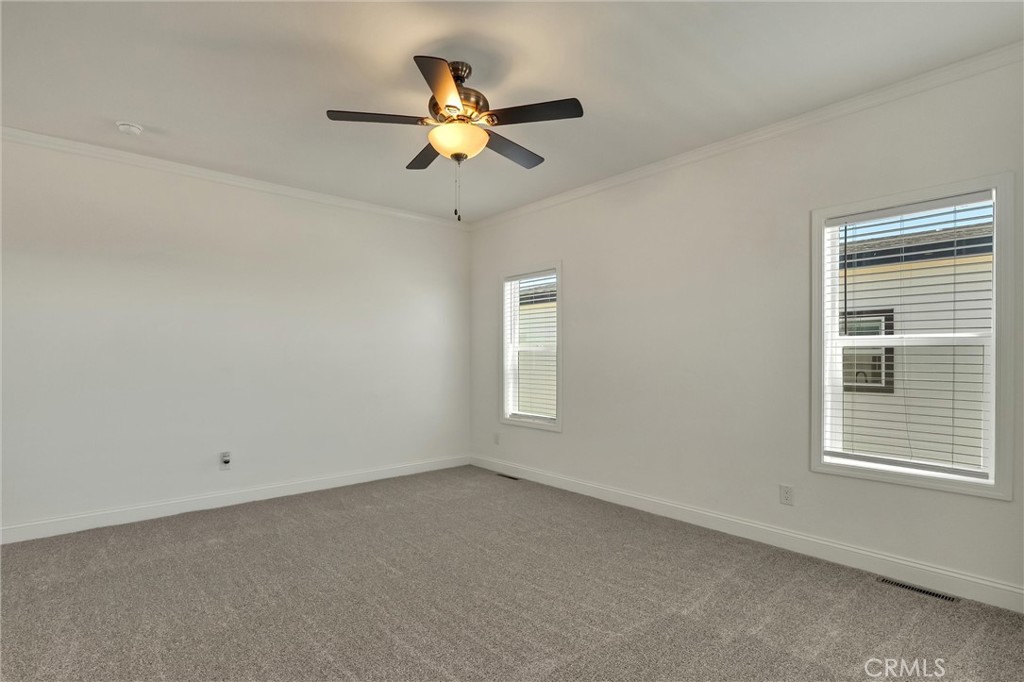 4333 Pentz Road, Unit 30 Paradise, CA 95969 - Photo 7 of 29 an empty room with a window and a fan