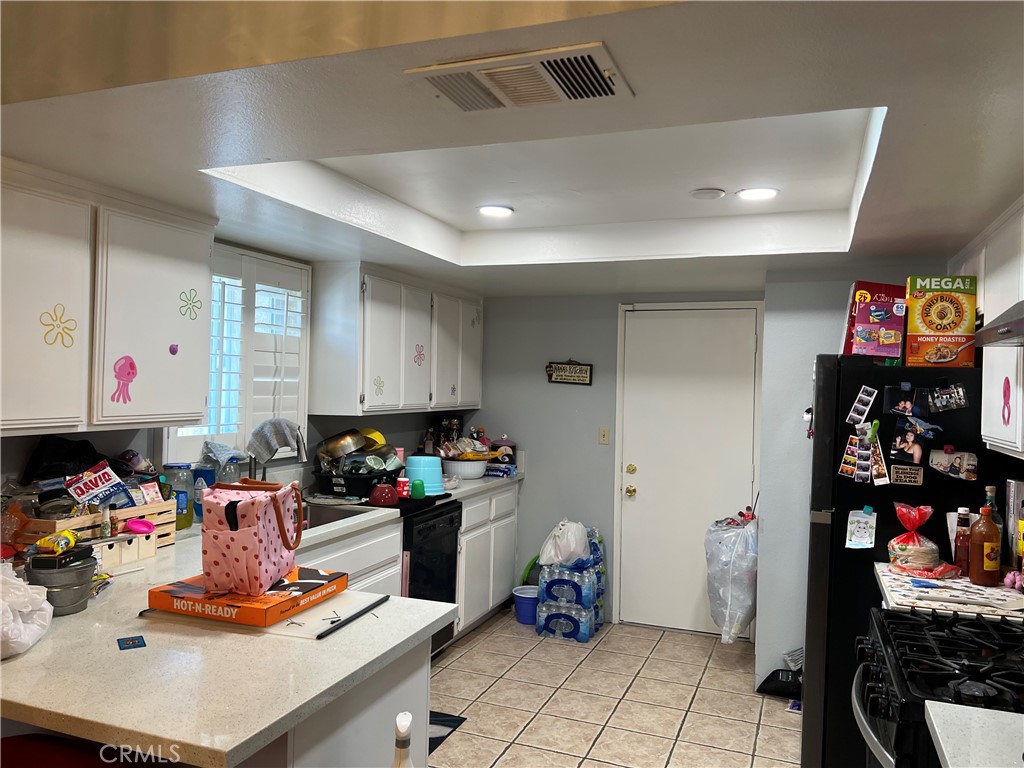 14560 Mission Street Cabazon, CA 92230 - Photo 3 of 6 a room with furniture and white walls