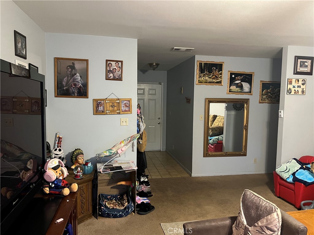 14560 Mission Street Cabazon, CA 92230 - Photo 5 of 6 a view of a room with gym equipment