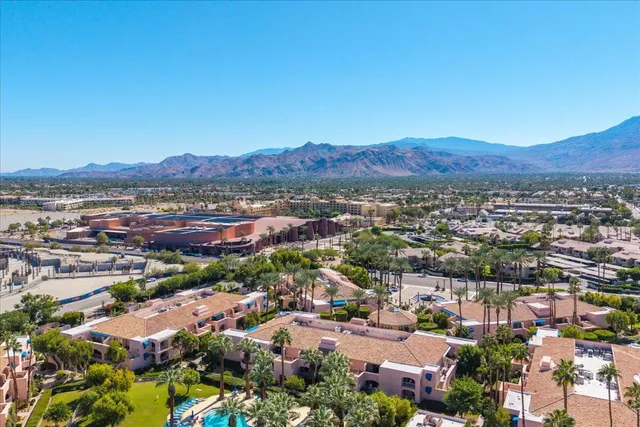 a view of a city with a lake