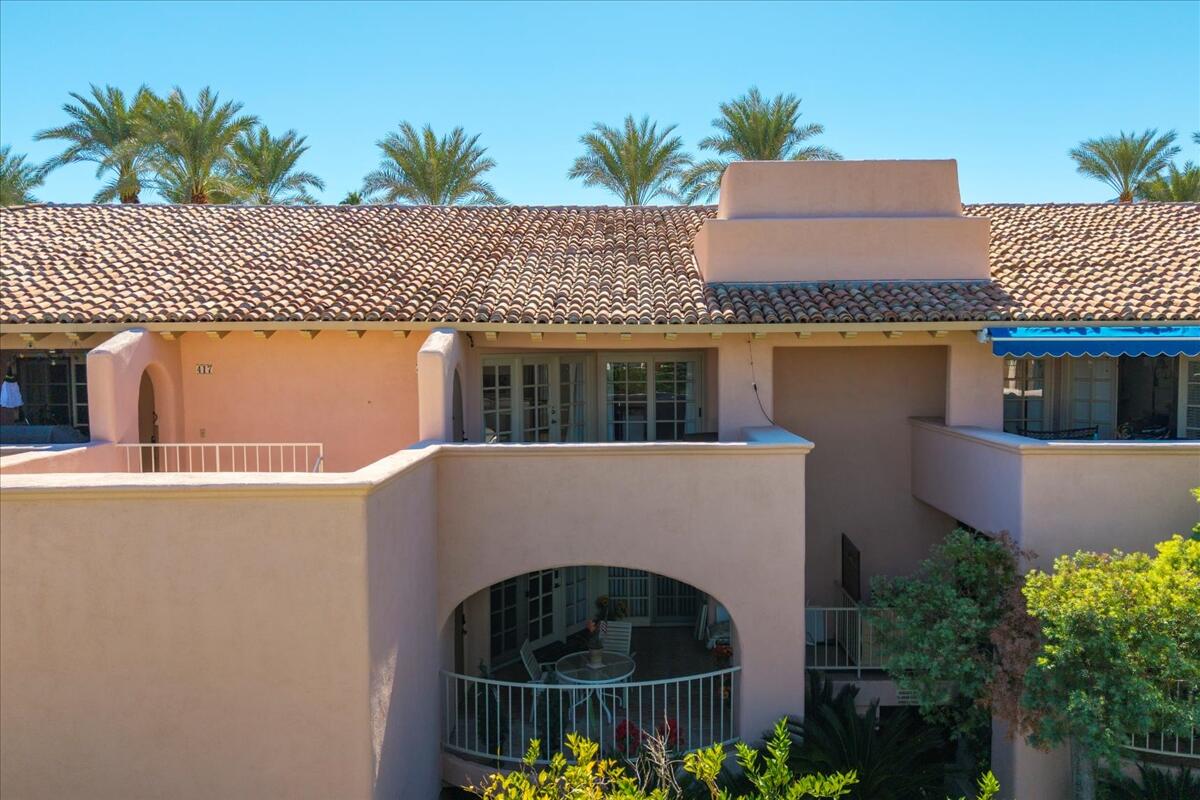 500 East Amado Road, Unit 416 Palm Springs, CA 92262 - Photo 37 of 48 a house view with a garden space