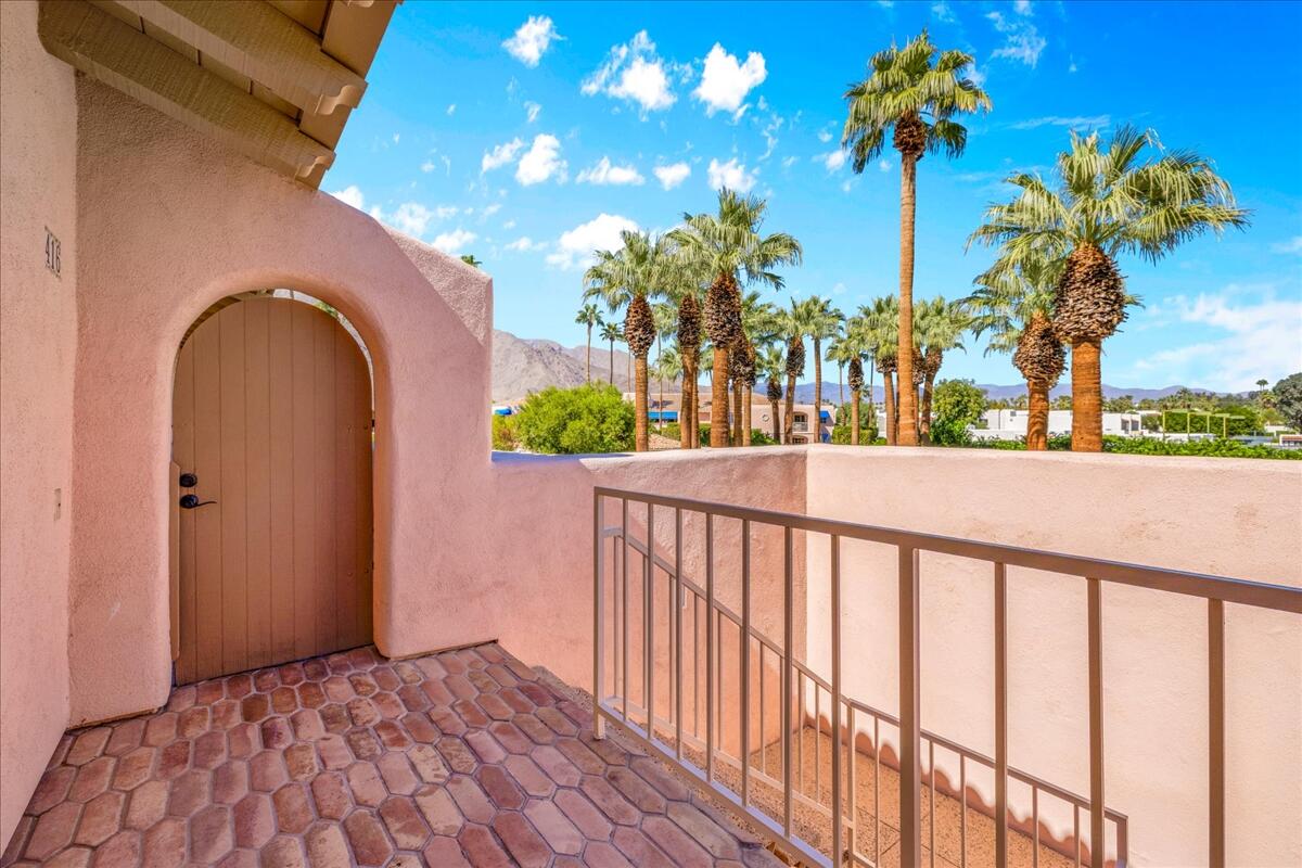 500 East Amado Road, Unit 416 Palm Springs, CA 92262 - Photo 39 of 48 a view of a houses from a balcony