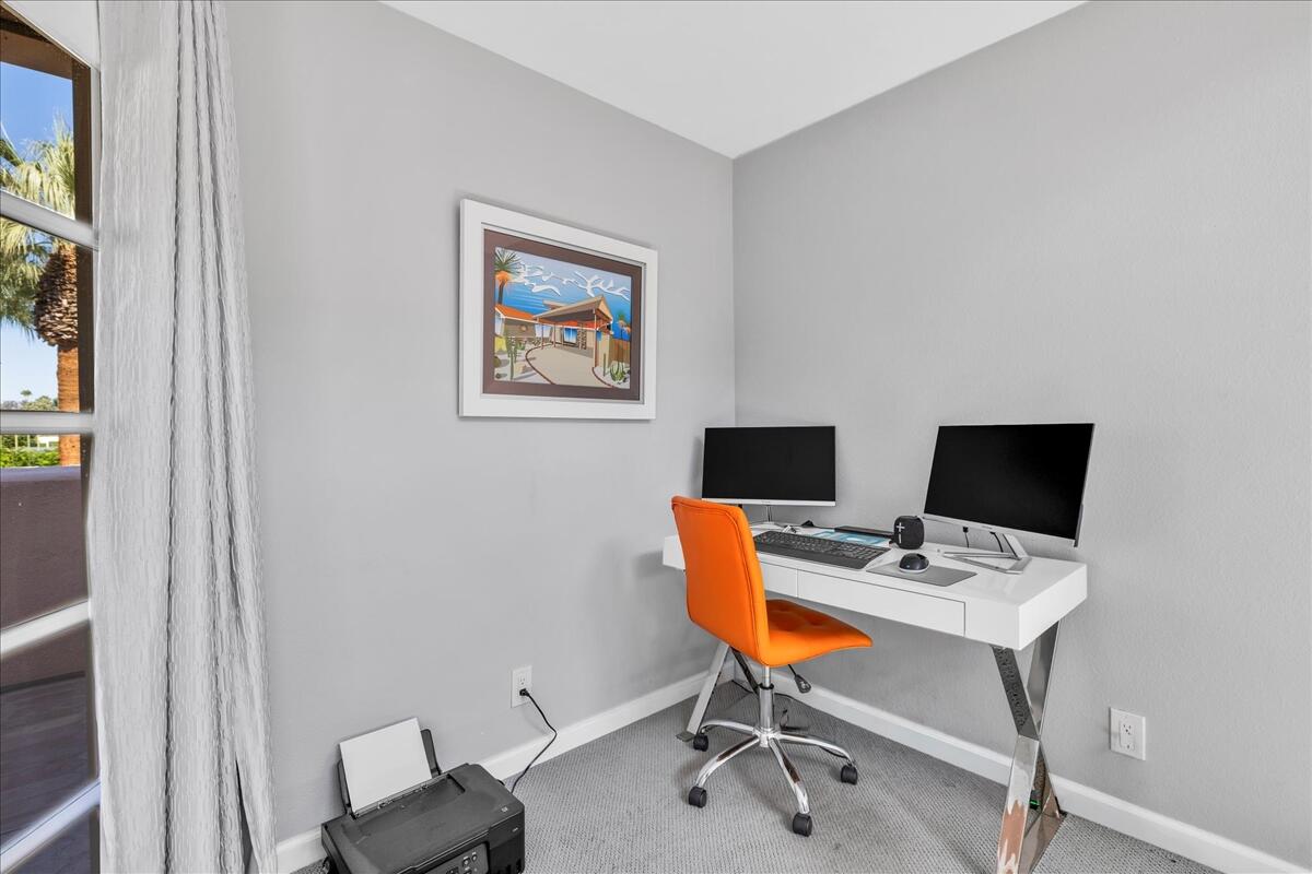 500 East Amado Road, Unit 416 Palm Springs, CA 92262 - Photo 6 of 48 a view of a workspace with furniture