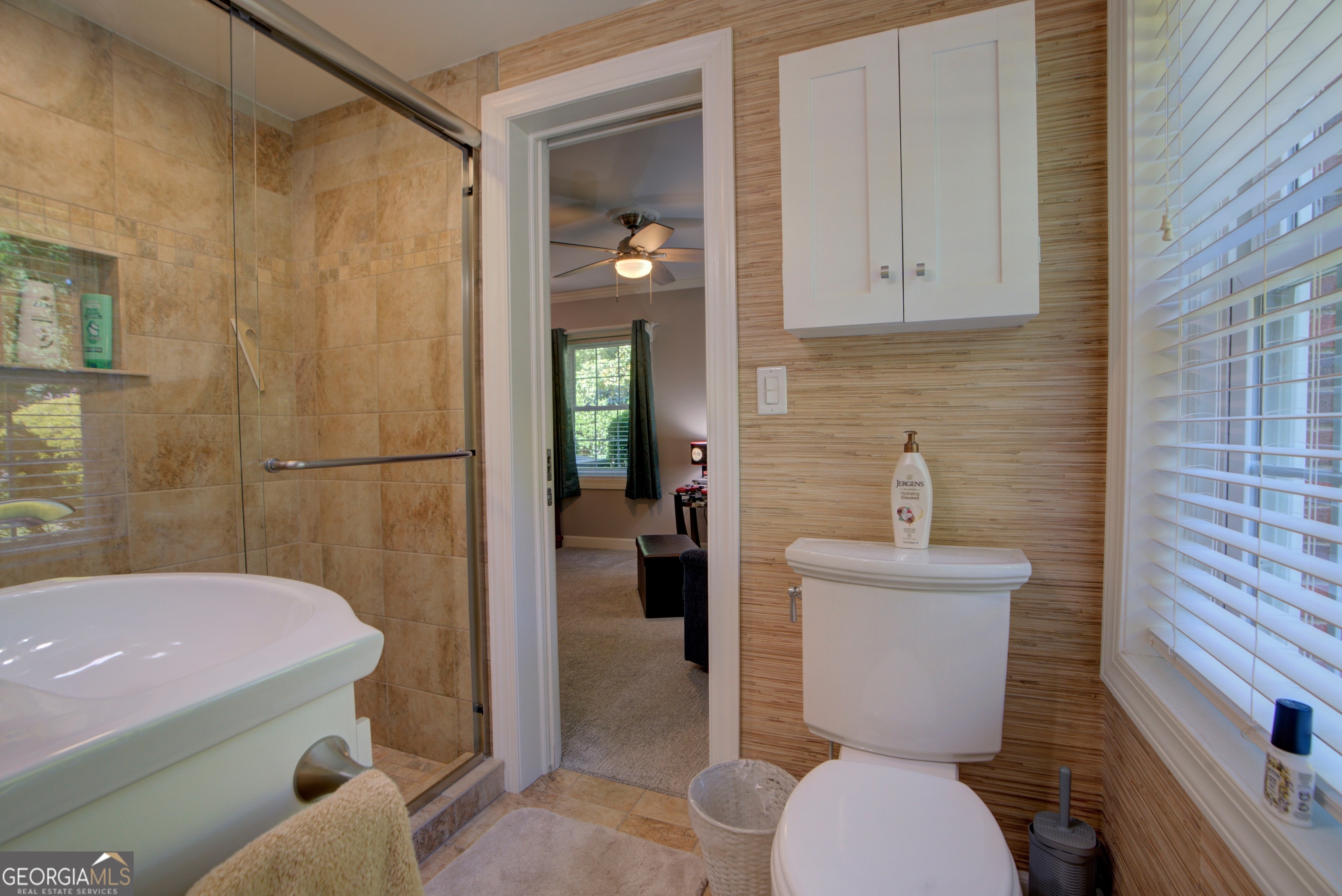 204 Green View Road Southwest Rome, GA 30165 - Photo 48 of 62 a bathroom with a toilet and a shower