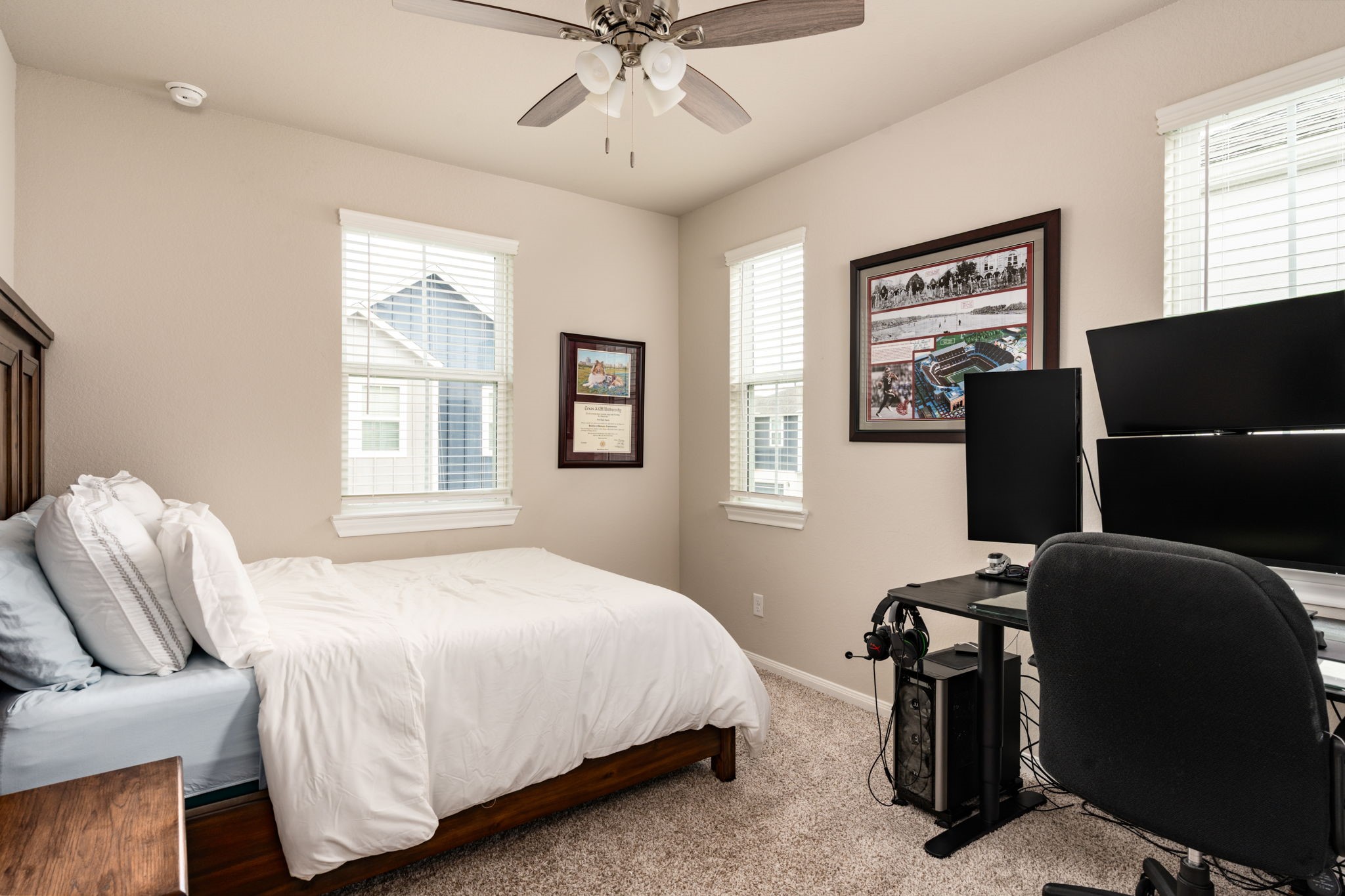 9810 Falling Fern Lane Houston, TX 77080 - Photo 14 of 30 a bedroom with furniture and windows