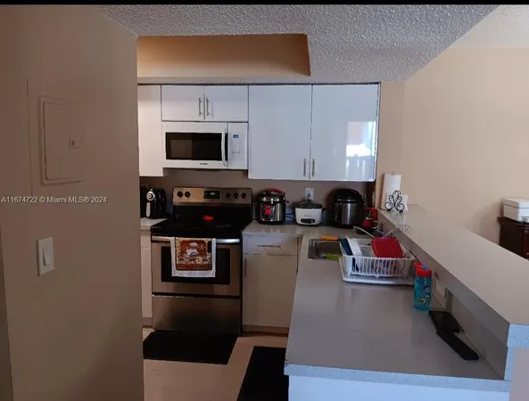 $290,000 | 18870 Northwest 57th Avenue, Unit 108, Hialeah, FL 33015