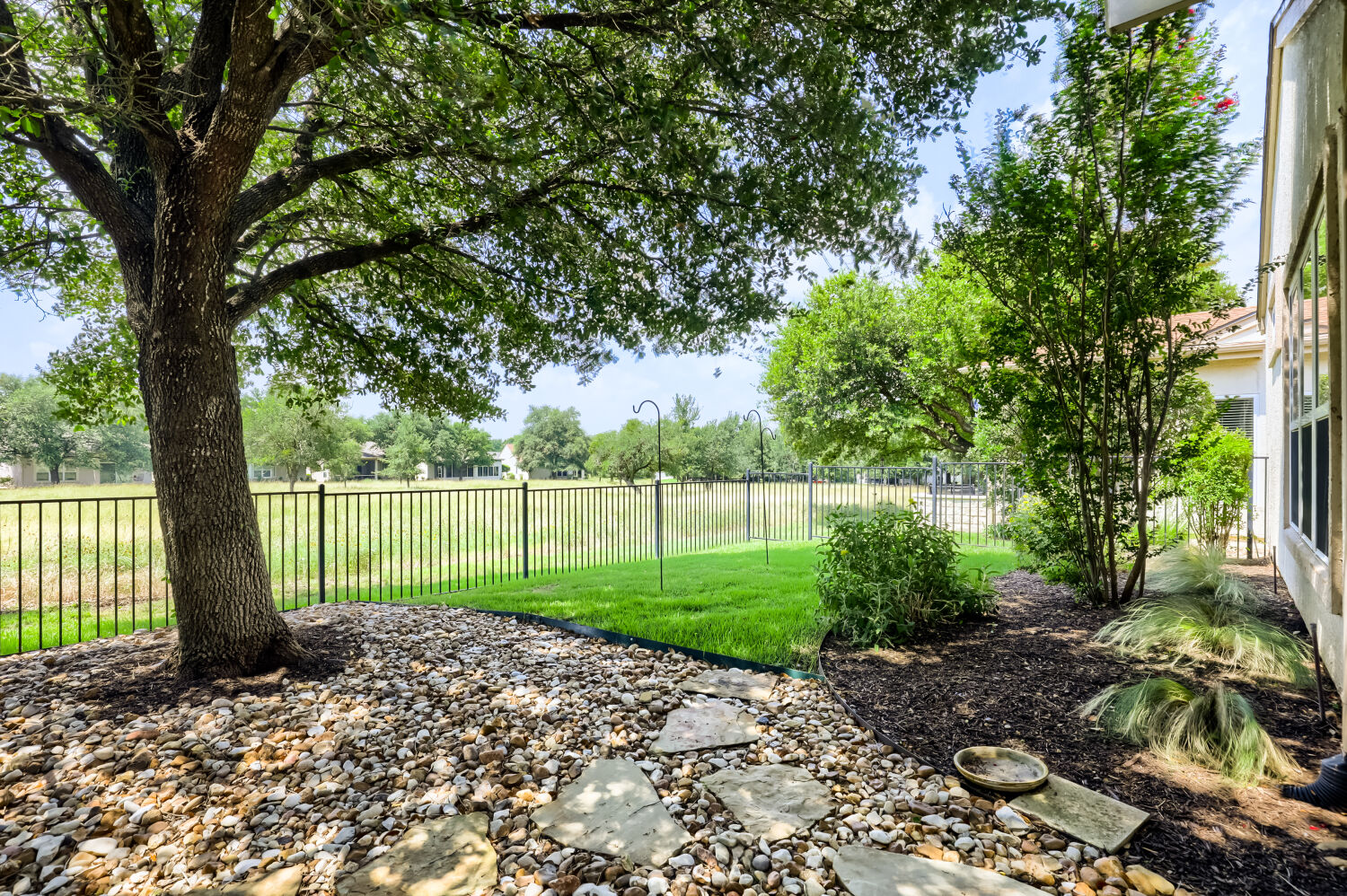 310 Crockett Loop Georgetown, TX 78633 - Photo 21 of 22 Super view of the greenbelt area with a fully fenced yard for your precious furry family member.