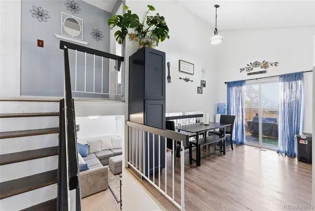 a view of a livingroom with furniture and windows