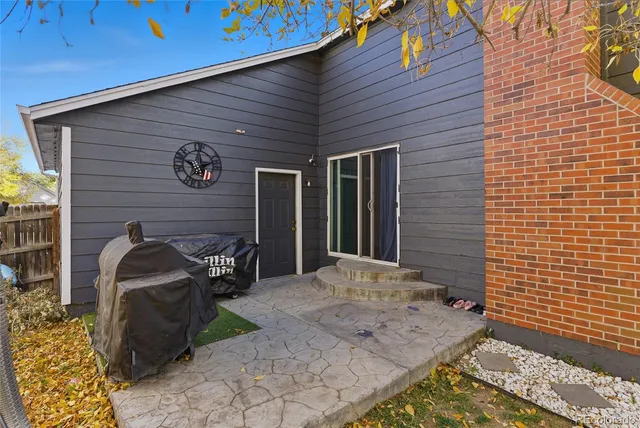 a front view of a house with parking space