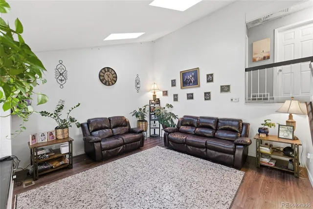 a living room with furniture and a couch