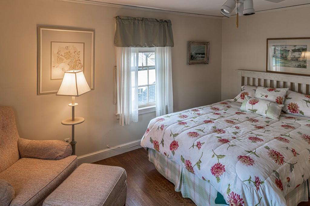 30 Pickwick Road Marblehead, MA 01945 - Photo 13 of 18 a bedroom with a bed and window