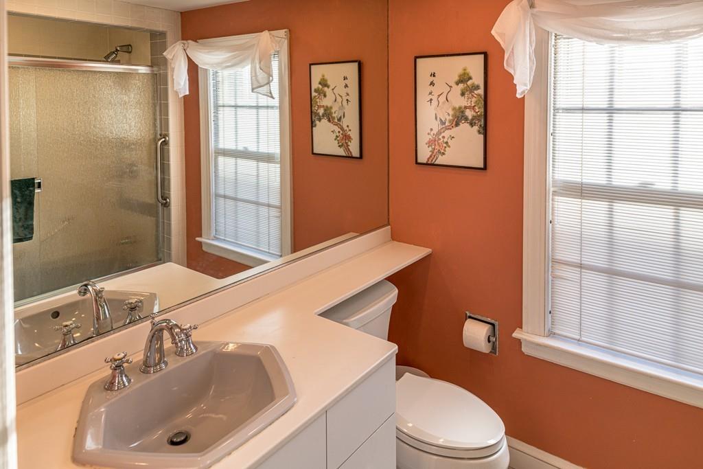 30 Pickwick Road Marblehead, MA 01945 - Photo 14 of 18 a bathroom with a sink toilet and window