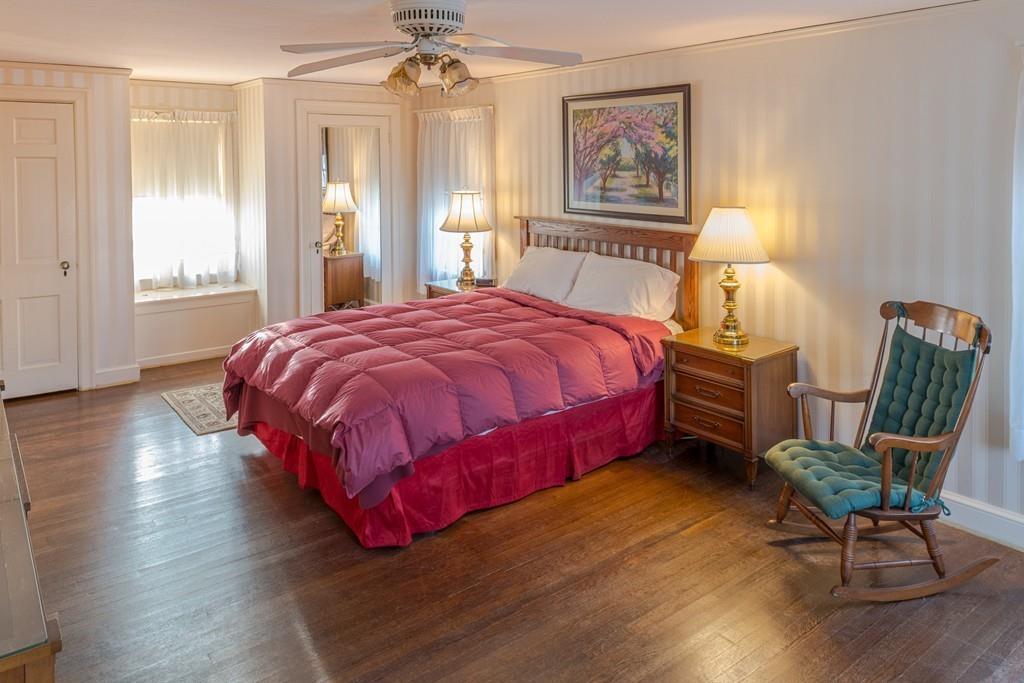 30 Pickwick Road Marblehead, MA 01945 - Photo 15 of 18 a bedroom with a bed chair and window