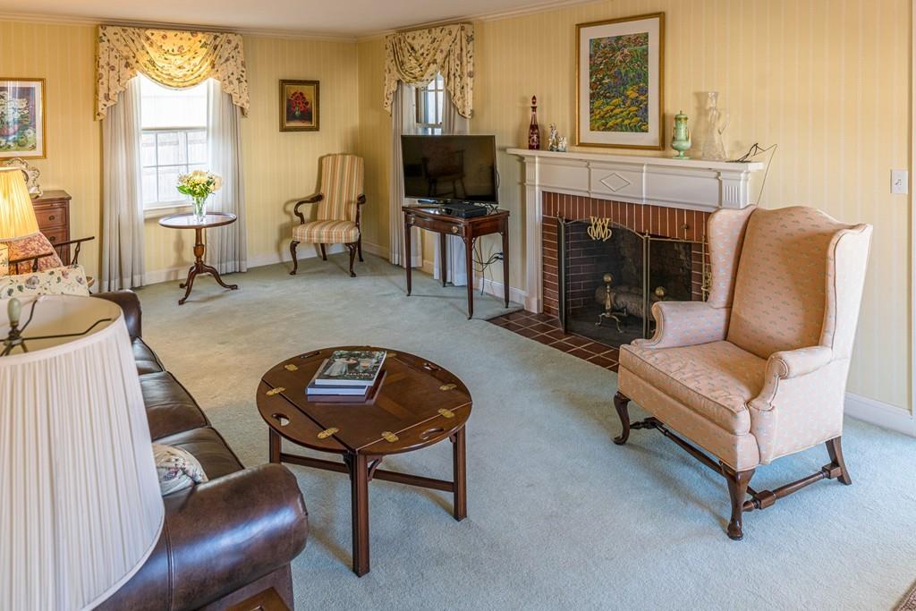 30 Pickwick Road Marblehead, MA 01945 - Photo 2 of 18 a living room with furniture and a fireplace